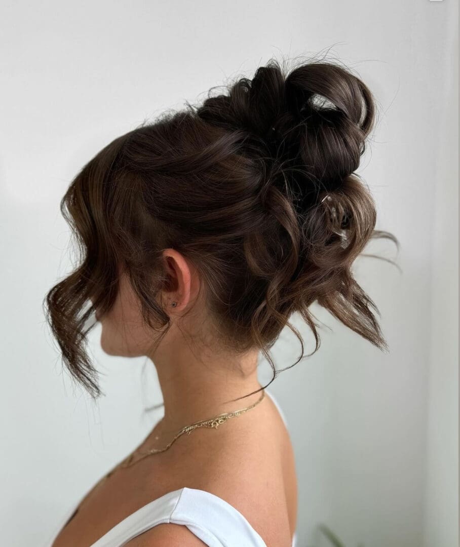 Tousled brunette updo — Salon Fiorella